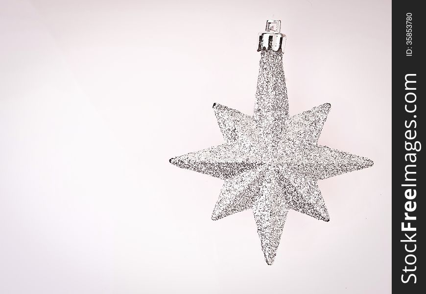 Ornament sliver star on white background with vignett conner and copy space. Ornament sliver star on white background with vignett conner and copy space