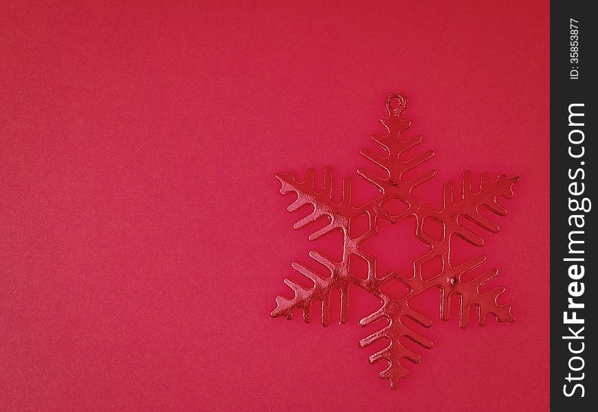 Red snowflake on red