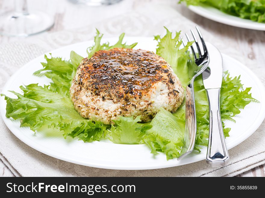 Baked homemade cheese on the plate