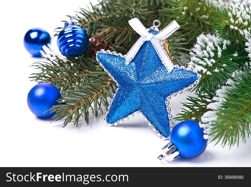 Christmas card - star, blue balls, fir branches, isolated