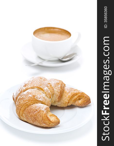 Fresh croissants and cup of espresso