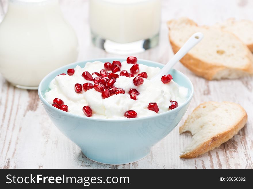 Homemade Yogurt With Pomegranate, Milk And Bread, Close-up