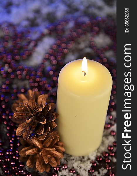 Composition Of A Christmas Candle, Cones And Beads