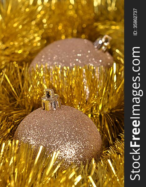 Christmas balls and golden tinsel. Christmas balls and golden tinsel