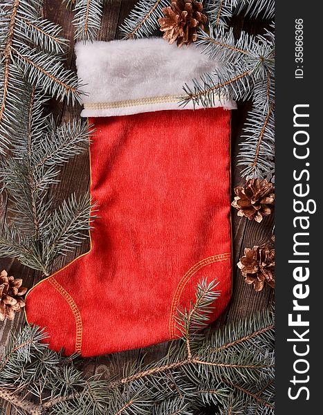 Composition Of A Red Christmas Sock And Fir Branches