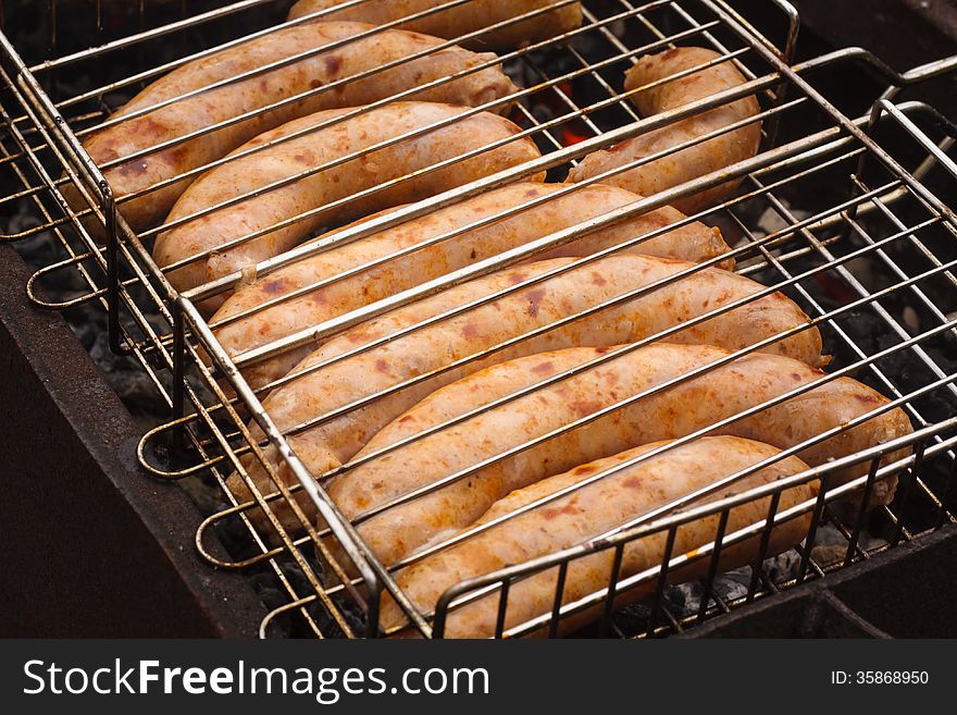 Delicious german sausages on the barbecue grill. Delicious german sausages on the barbecue grill
