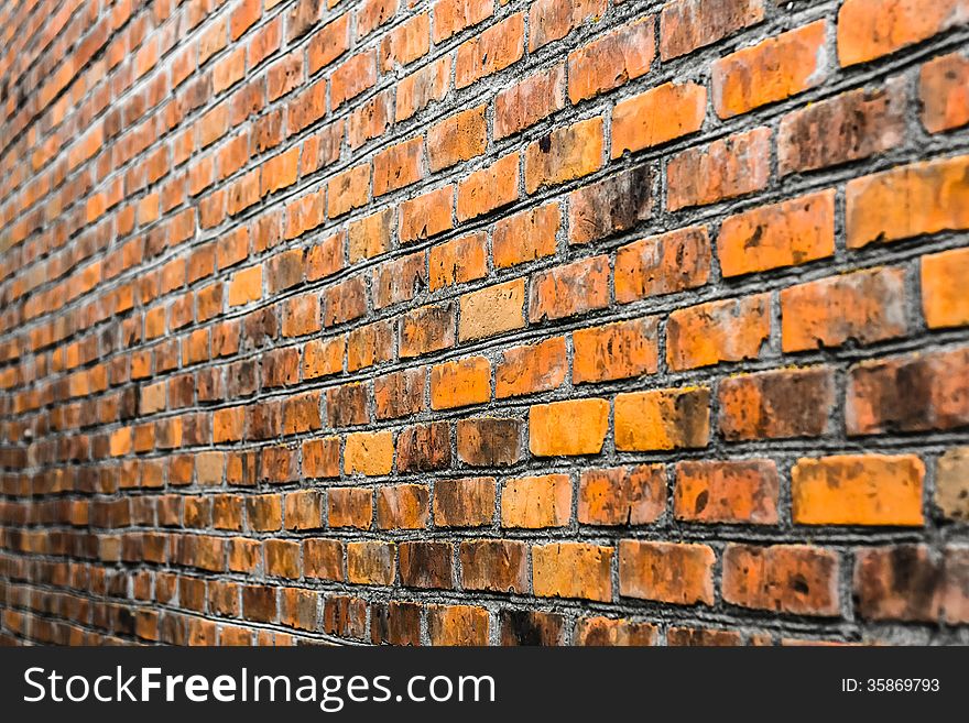 Perspective Of A Dirty Red Brick Wall. Selective Focus. Perspective Of A Dirty Red Brick Wall. Selective Focus