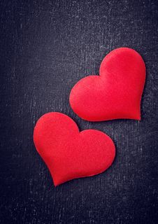 Two Red Hearts On A Black Board Royalty Free Stock Photos