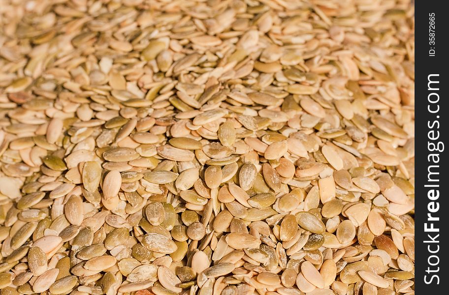 Close up of organic pumkin seeds / kernels. Background. Close up of organic pumkin seeds / kernels. Background.