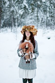 Forest Woman With Autumn Leaves And Little Doll In White Snow Winter Royalty Free Stock Image Forest Woman With Autumn Leaves And Little Doll In White Snow Winter Royalty Free Stock Image