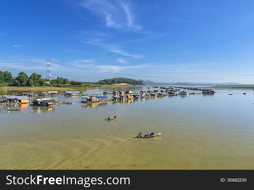 Floating village on the La Nga river in Vietnam