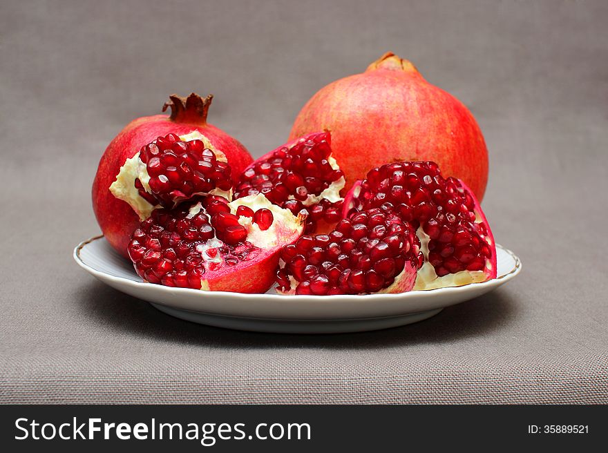 Ripe Pomegranate On A Plate