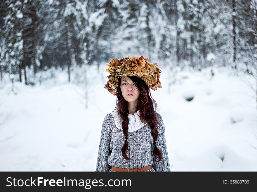 Forest Woman With Autumn Leaves In White Snow Winter