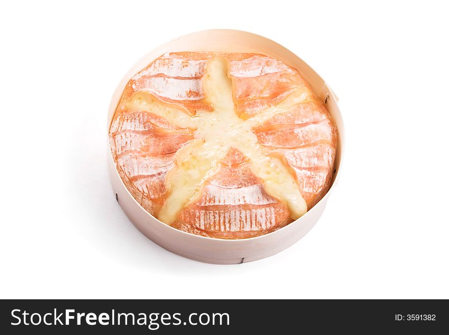 Backed camembert cheese in orange crust sliced at center. Object isolated on white background. Clipping path included.