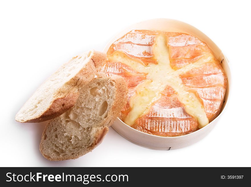 Backed camembert cheese with french baguette. Object isolated on white background. Backed camembert cheese with french baguette. Object isolated on white background.