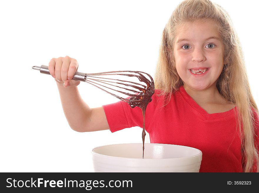 Shot of a little girl mixing brownie batter