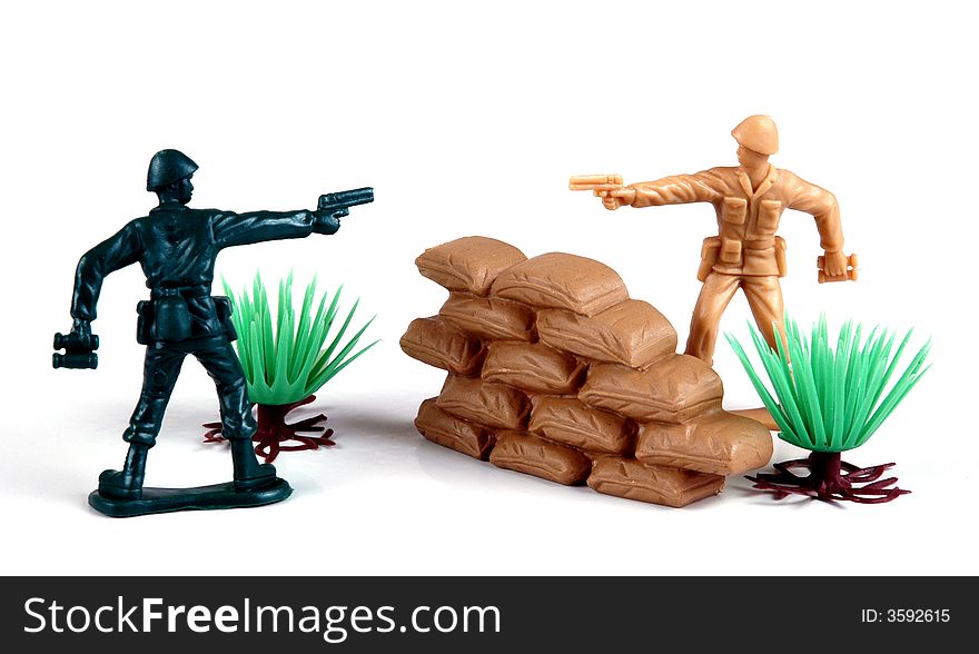 A military scene with plastic toy soldiers. A military scene with plastic toy soldiers.