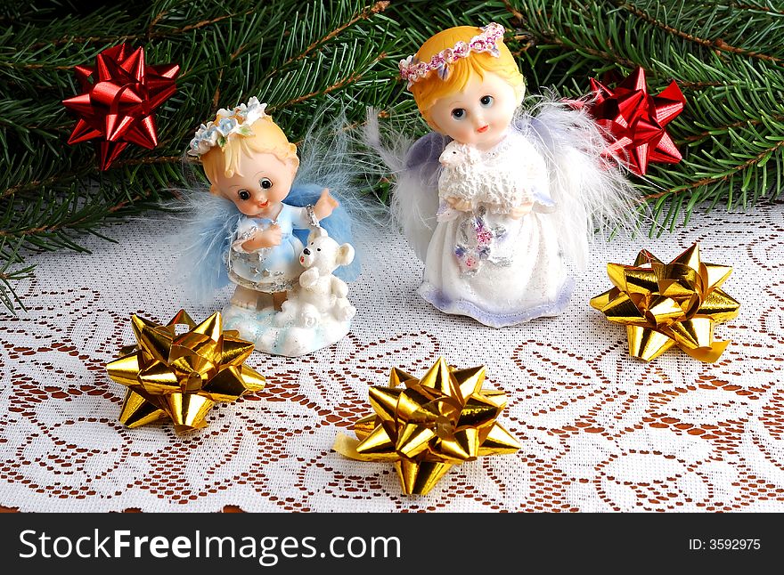 Christmas angels decorations on crumb-cloth