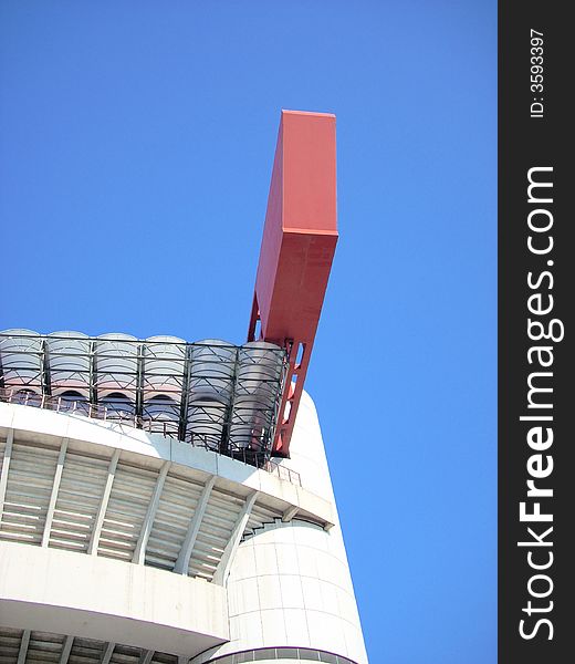 A part fo the San Siro stadium in Milan under a blue sky. A part fo the San Siro stadium in Milan under a blue sky