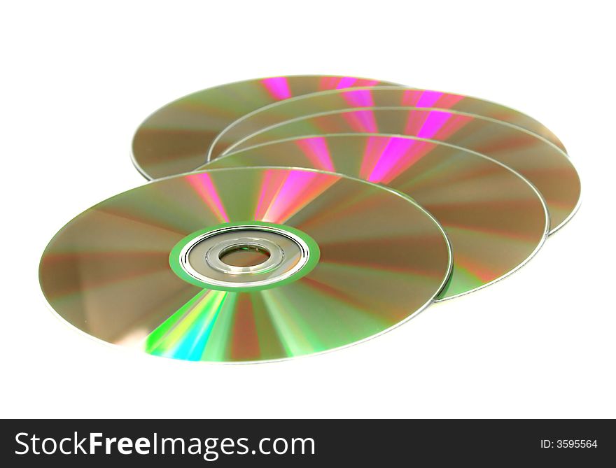 Many gold CD's isolated on the white background. Many gold CD's isolated on the white background