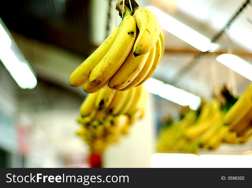 A local fruitseller selling bananas