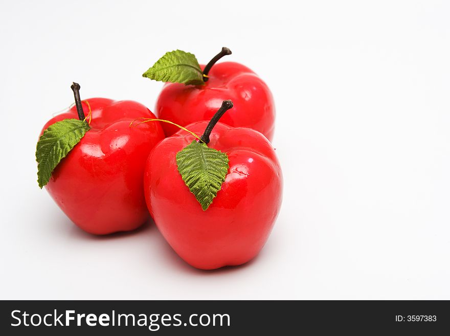 Christmas decoration red apple isolated on light background