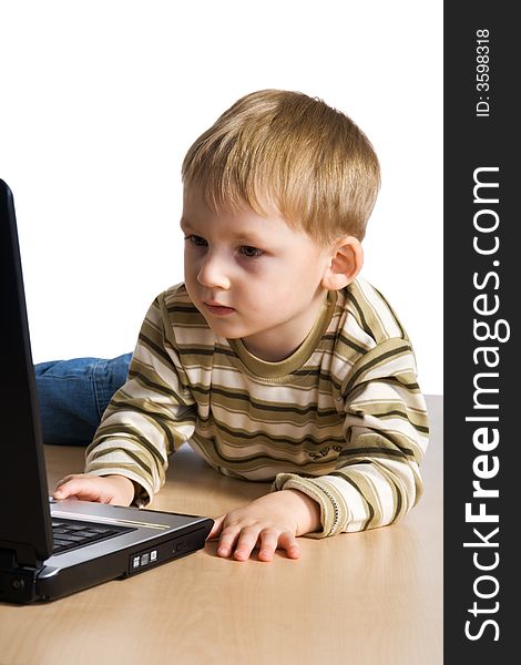 Young boy using a laptop