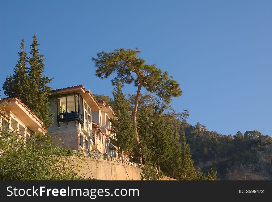 Bungalow in the Mediterranean style on the sea beach