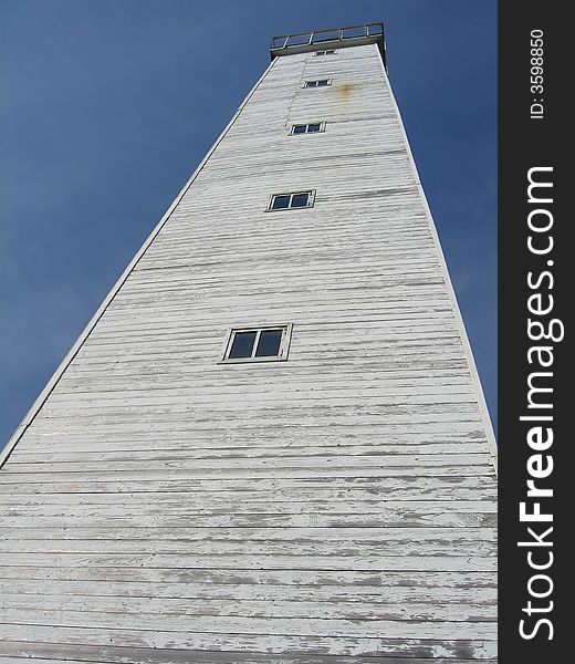 The beacon photographed on a background of the dark blue sky