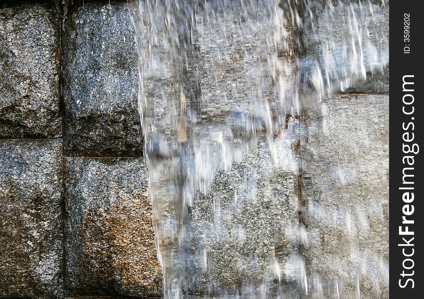 Bricks Behind A Waterfall