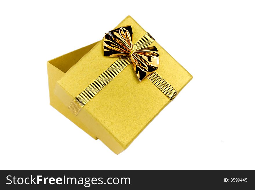 Opened gold shining gift box isolated on white background.