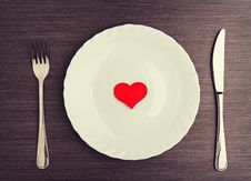 Plate, Fork, Knife And Red Heart Stock Photos