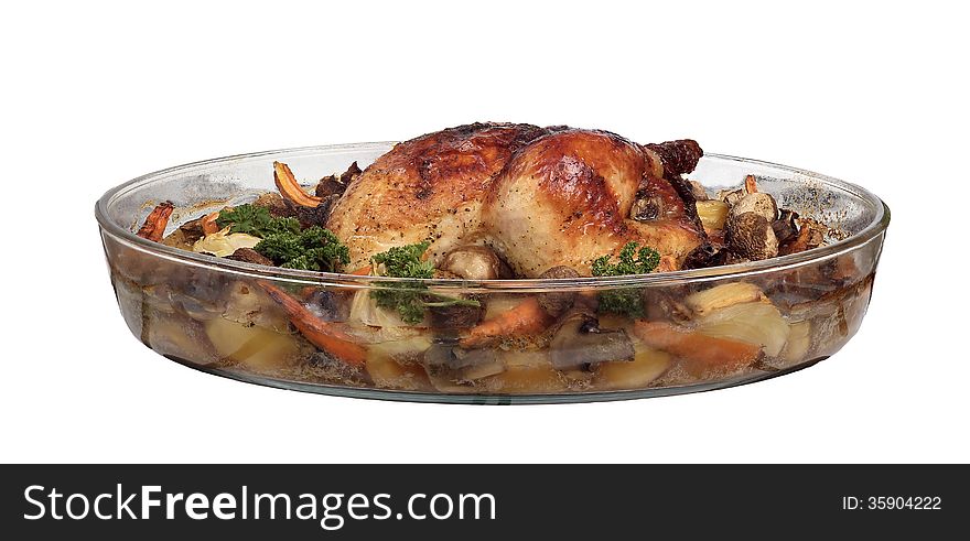 Roasted chicken with vegetables isolated on white background