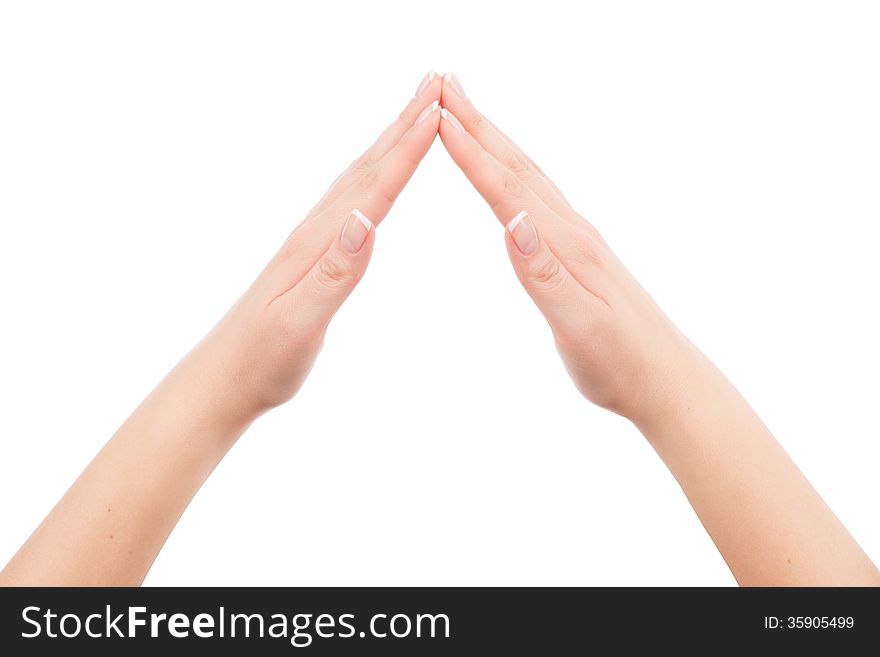 Woman hands showing home symbol gesture, isolated on white background. You can put any image or symbol between hands.