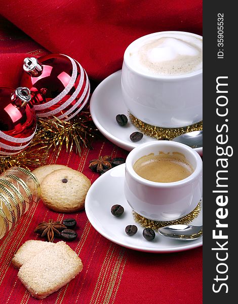 Milk and coffee with espresso on background of red cloth and pastries. Milk and coffee with espresso on background of red cloth and pastries