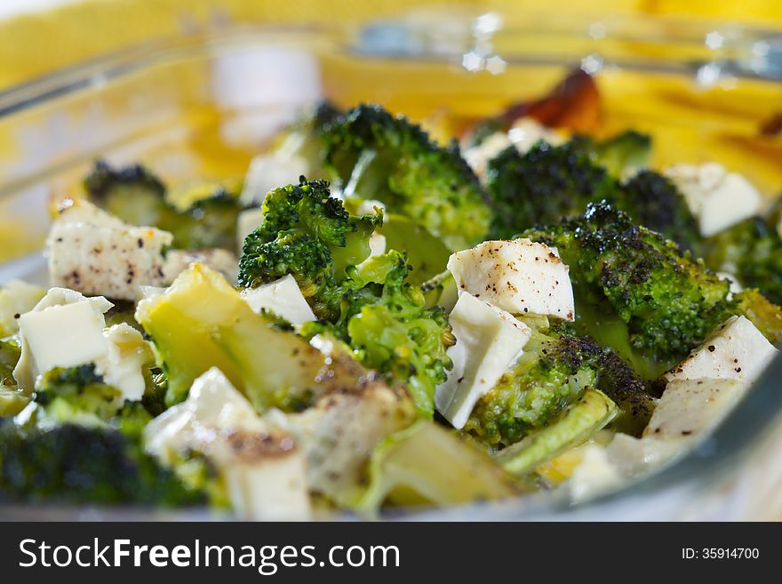 Casserole of broccoli, zucchini with feta cheese.