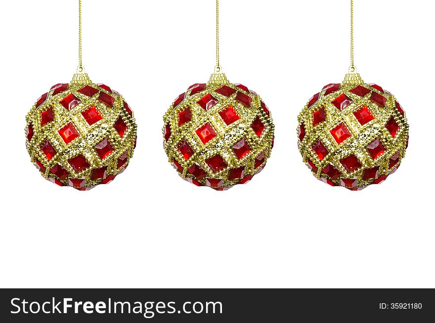 Toys for the Christmas tree, three red-yellow sphere on a white background. Toys for the Christmas tree, three red-yellow sphere on a white background