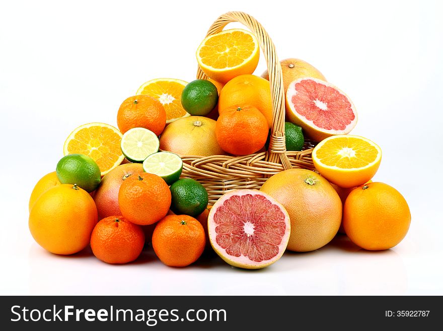 Mixed citrus fruit in wicker basket