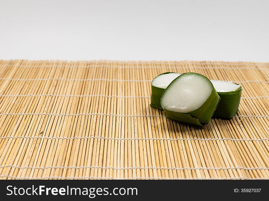 Thai Dessert sweet Coconut Milk on Banana leaf (Kanom Tako) on mat. Thai Dessert sweet Coconut Milk on Banana leaf (Kanom Tako) on mat