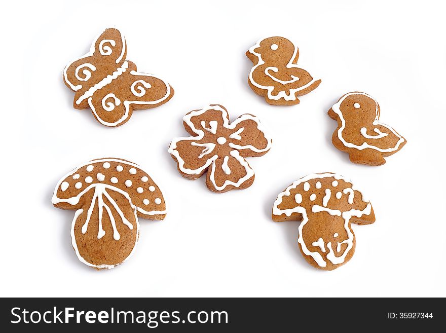Various Christmas decorated gingerbread on white background. Various Christmas decorated gingerbread on white background