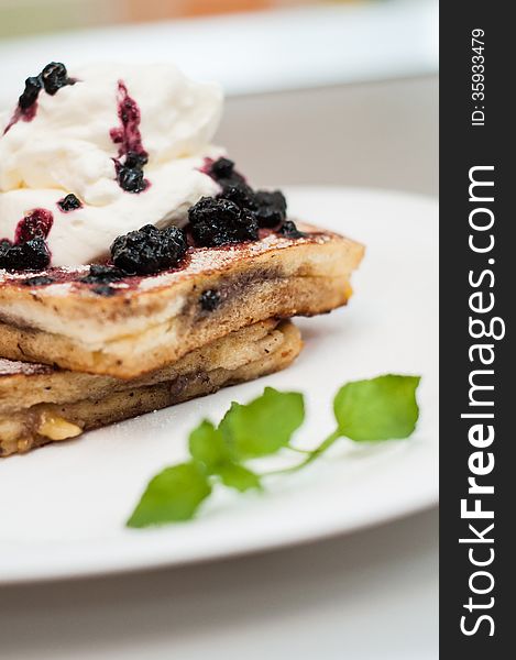 French toast with whip cream and blueberries jam