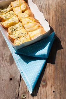 Fresh-baked Garlic Bread With Herbs, On White Bread Tray Stock Image Fresh-baked Garlic Bread With Herbs, On White Bread Tray Stock Image