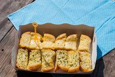 Fresh-baked Garlic Bread With Herbs, On White Bread Tray Stock Image Fresh-baked Garlic Bread With Herbs, On White Bread Tray Stock Image