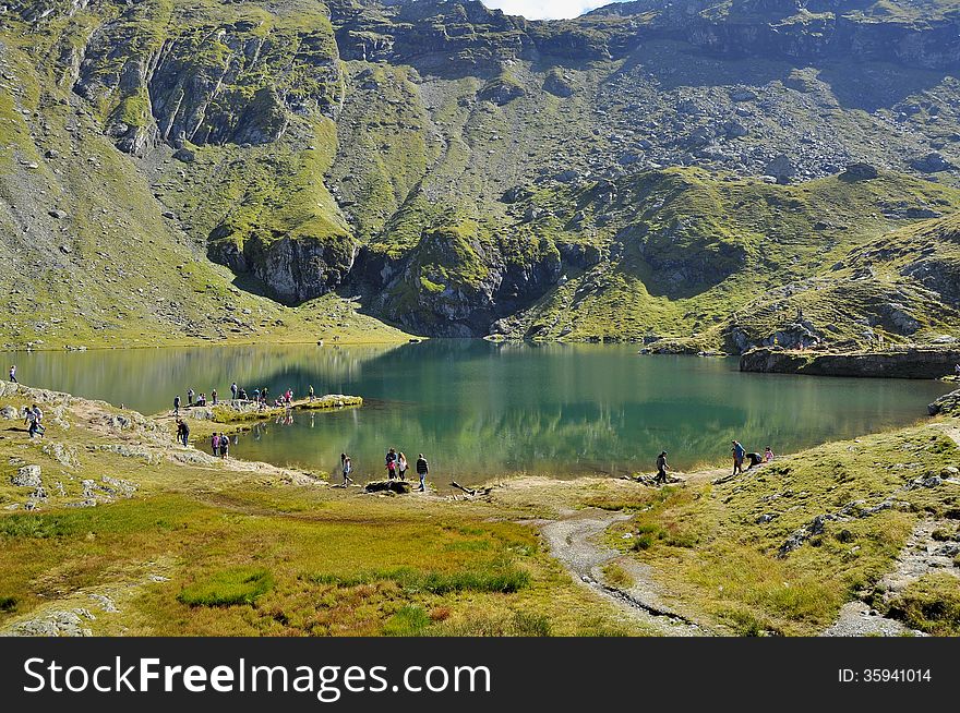 Turquoise water lake in the high mountains