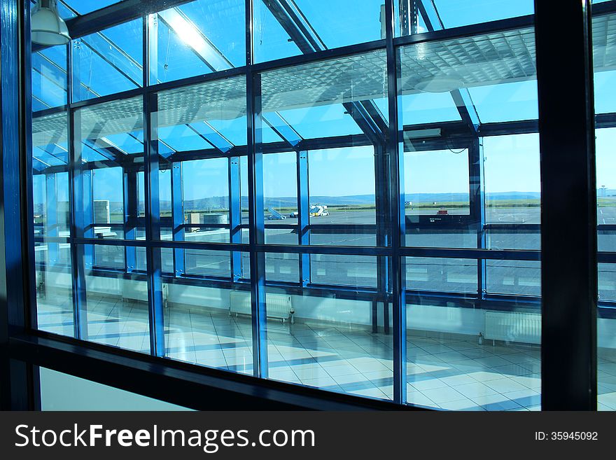 A photo of blue window frame in airport