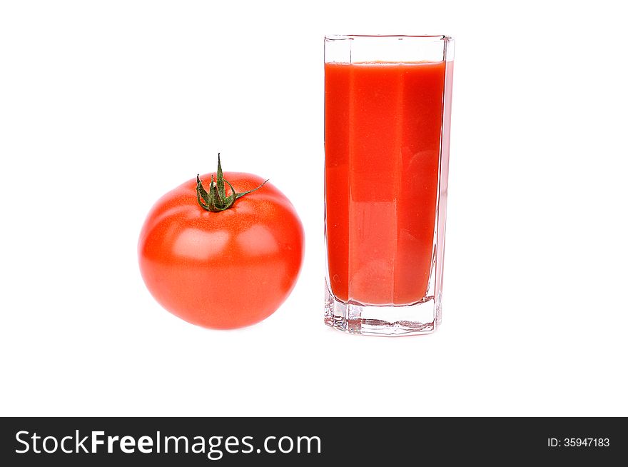 Full glass of fresh tomato juice and tomatoes isolated on white