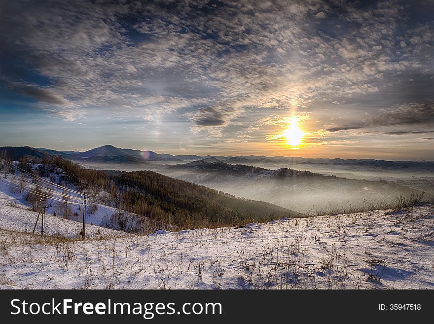 Colourful mountain landscape with fog, during the winter period. Colourful mountain landscape with fog, during the winter period.