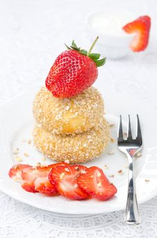 Cheese Pancakes With Fresh Strawberries On A Plate And Yogurt Stock Photos Cheese Pancakes With Fresh Strawberries On A Plate And Yogurt Stock Photos