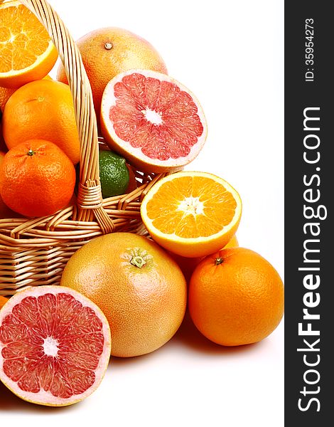 Mixed citrus fruit in wicker basket