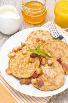 Pancakes With Peaches And Honey For Breakfast, Top View Royalty Free Stock Photo Pancakes With Peaches And Honey For Breakfast, Top View Royalty Free Stock Photo